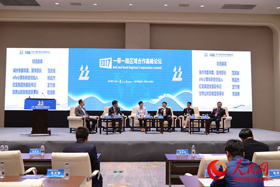 深化政策沟通 政府与企业的战略对接。摄影 张启川